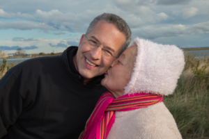 Patient kissing Dr. Israeli on the cheek at Making Strides of Long Island 2018