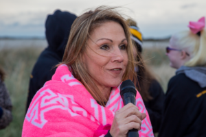 Patient on microphone at Making Strides of Long Island 2018 photo