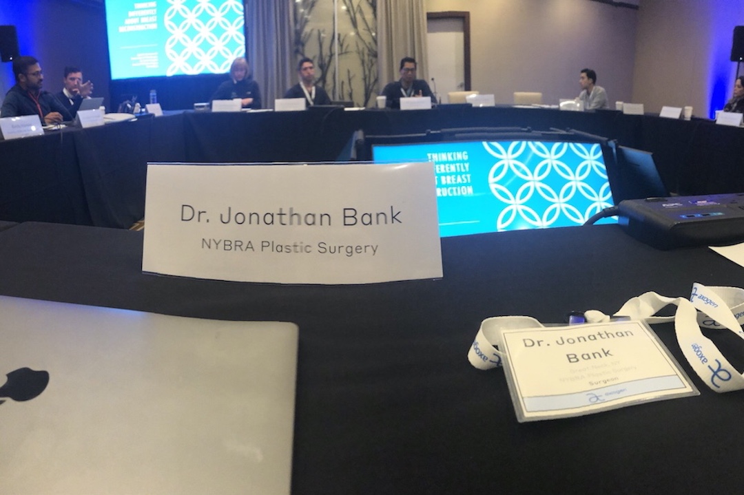 color photo of Dr. Bank's name tent card at the Resensation and Axogen Symposium event in 2020.