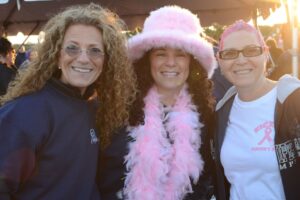 Mollie Sugarman and two women pose at Making Strides of Long Island 2012