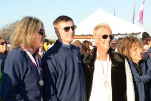 Dr. Korn stands with two women in sunglasses at Making Strides of Long Island 2012