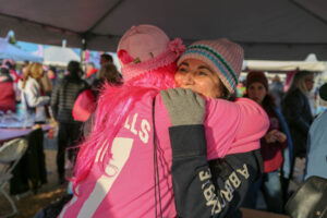 Bella hugs patient at Making Strides of Long Island 2019