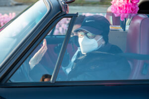 Woman with mask in car at Making Strides 2020 Drive Through photo