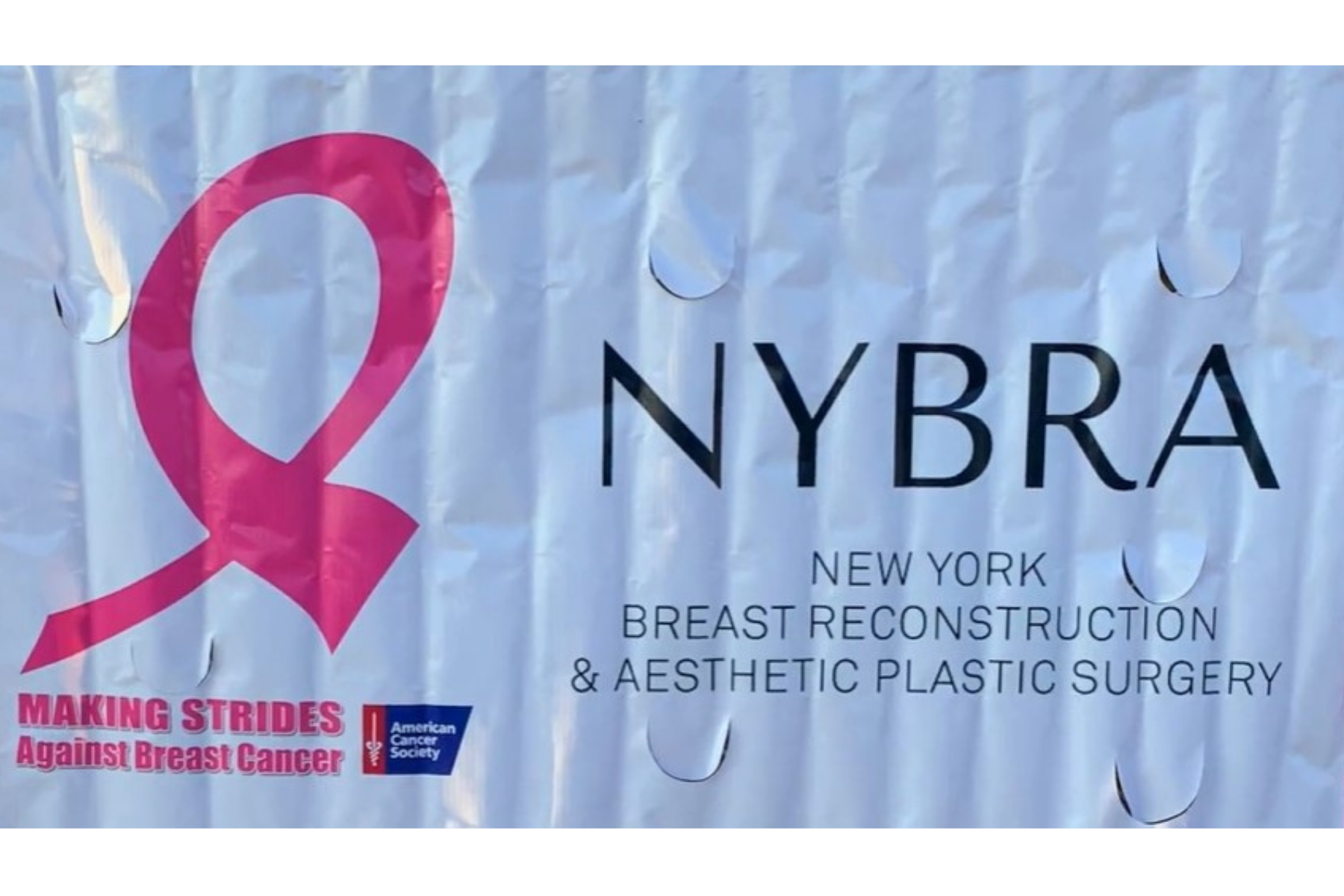 Close up of NYBRA's Making Strides 2020 Drive Through sponsorship banner.