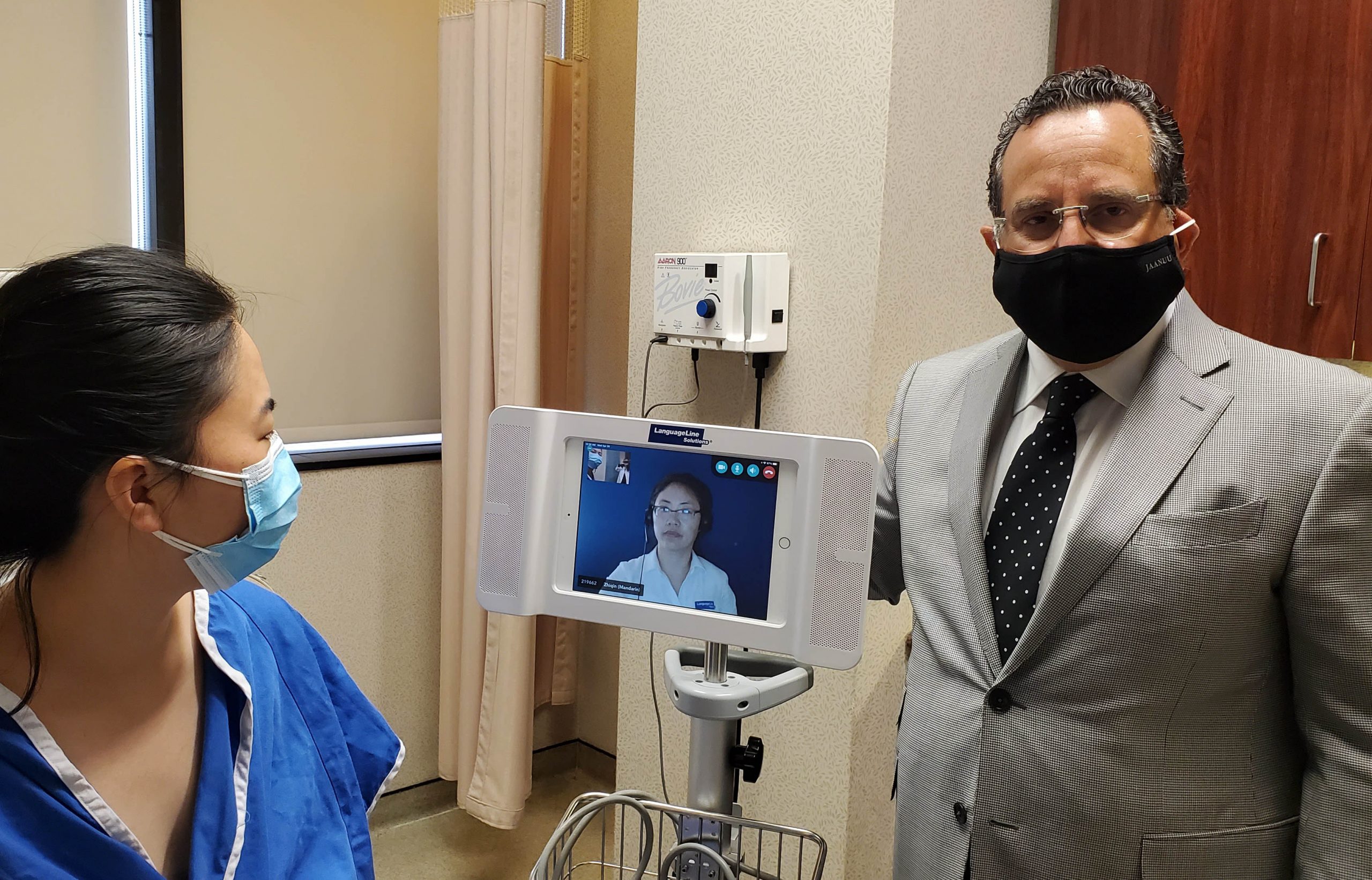 Dr. Feingold with LanguageLine Translator Machine and Patient