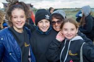 Annie and three girls pose for camera atMaking Strides of Long Island 2018