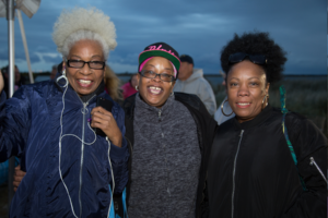 Three woman smile for camera at Making Strides of Long Island 2018
