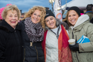 Mollie and three women smile at Making Strides of Long Island 2018