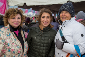 Three women smiling for camera atMaking Strides of Long Island 2018 photo