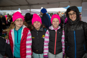 Three kids with pink hats at Making Strides of Long Island 2018 photo