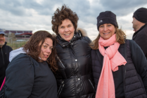 Three women smiling at Making Strides of Long Island 2018 photo