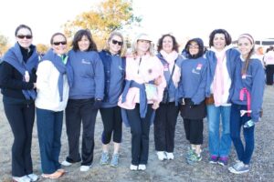 Group of 7 woman pose for camera at Making Strides of Long Island 2013