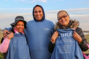 Three people pose at Making Strides of Long Island 2019