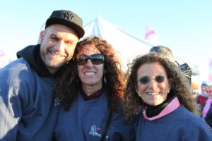 Mollie Sugarman poses with couple at Making Strides of Long Island 2013