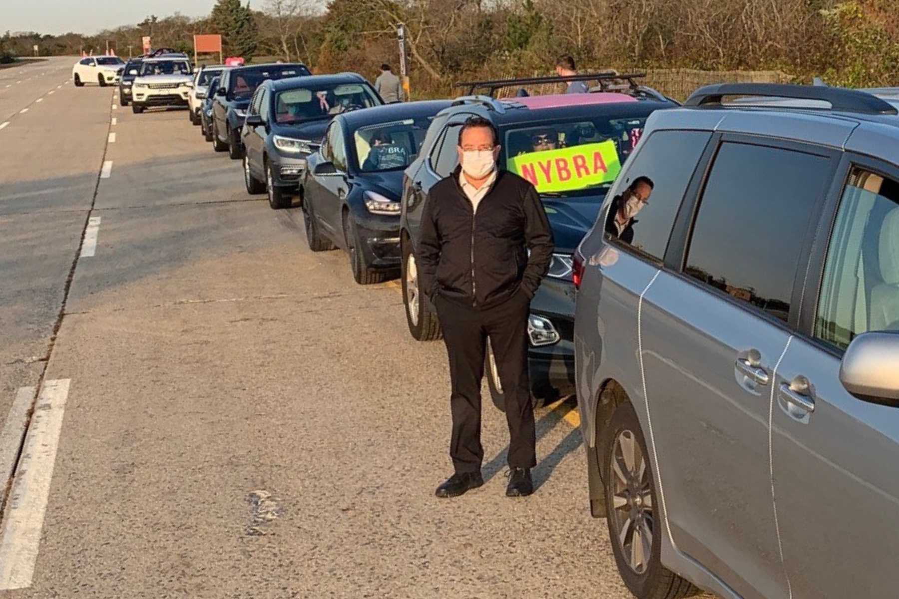 Dr. Feingold stands in front of NYBRA line of cars before the Making Strides 2020 Drive Through Experience at Jones Beach.