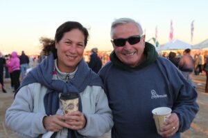 Couple smiling for camera at Making Strides of Long Island 2013
