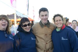 Two women and one man pose at Making Strides of Long Island 2012