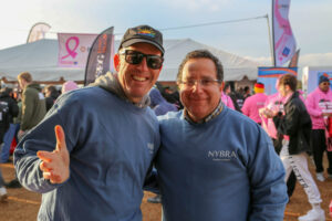 Dr. Feingold and man smile for camera atMaking Strides of Long Island 2019