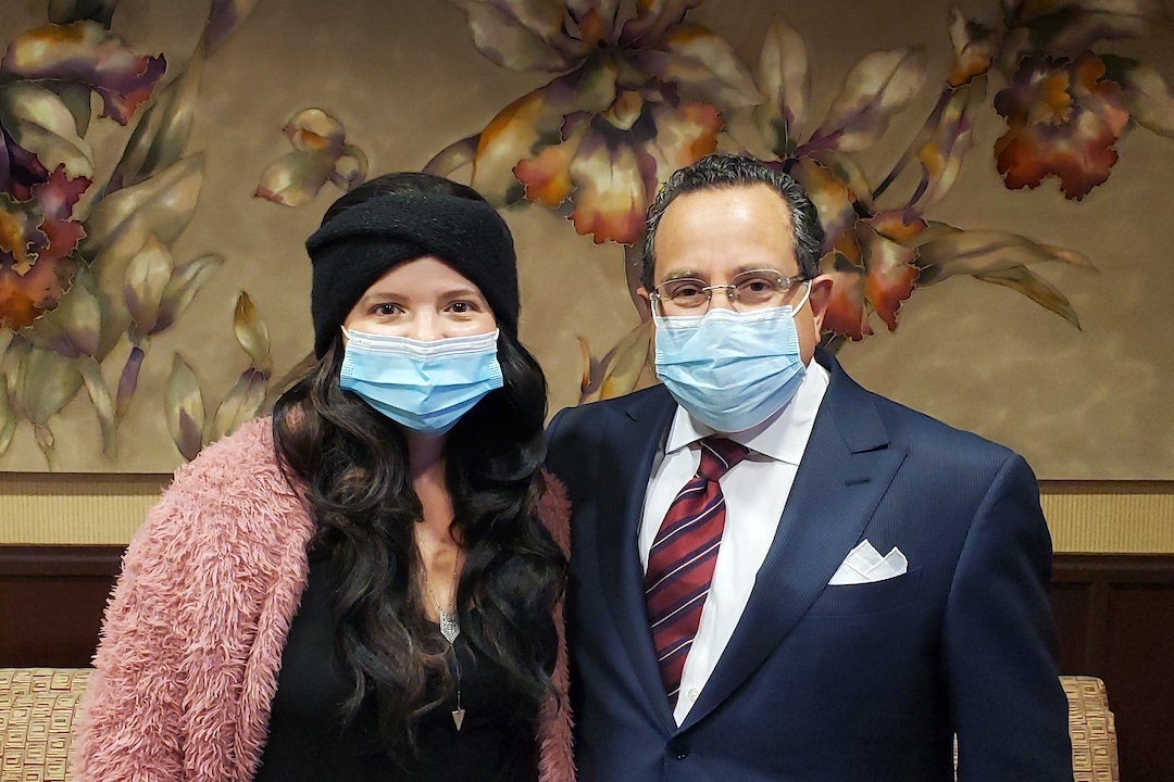 Close up color photo of Jenn and Dr. Feingold at last visit in our office.