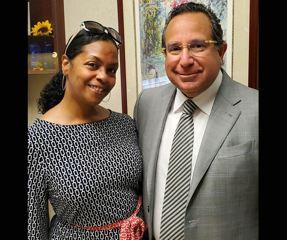 Christina and Dr. Feingold pose for camera during her last visit.