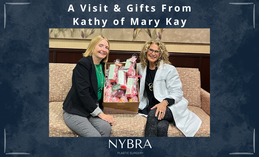 Kathy Viola of Mary Kay gifts Mollie Sugarman, NYBRA Plastic Surgery Clinical Director of the Patient Empowerment Program products for breast reconstruction patients
